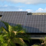 residential-house-with-rooftop-covered-with-solar-photovoltaic-panels-for-producing-of-clean-ecological-electrical-energy-in-suburban-rural-area